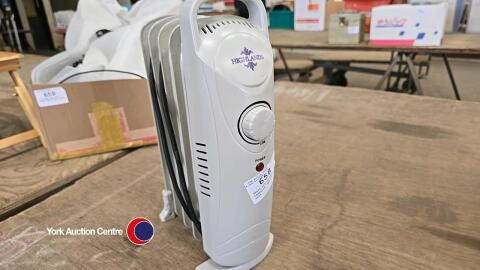 Small oil filled radiator, approx 13.5in tall