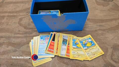 Box of Pokemon trading cards