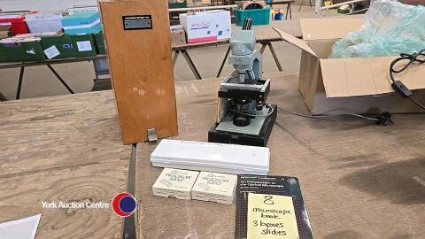 Boxed microscope with slides and introductory book