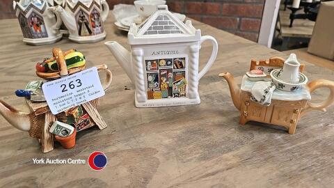 Portmerion, washstand, miniature teapot H 7.5cm L 7.5 W 5, Cardew, gardening bench, miniature teapot, H 7.5cm L 7.5 W 5, Wade, English Life, Antiques Shop, teapot H 15cm L 10 W 7.5 and decorative cat teapot H 17.5 L 10 W 10