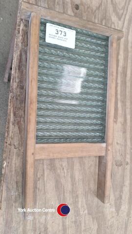 Antique glass and wooden washboard