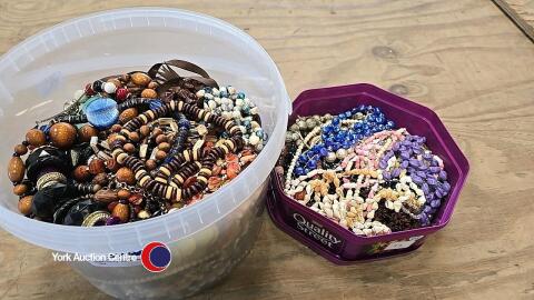 Quantity of bead jewellery in boxes and tubs