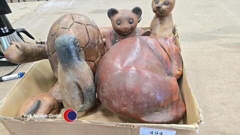 Box of wooden animal figurines