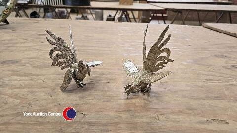 Pair of silver plated fighting cockerels