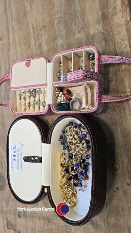Small carrying case containing rings and loose beads with zipped container of misc jewellery