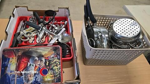 Box of kitchen items including pans, cutlery and utensils