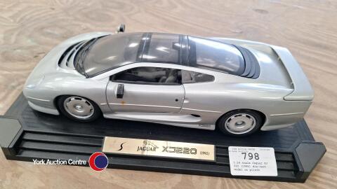 1:14 scale Jaguar XJ 220 (1992) die-cast model on plinth