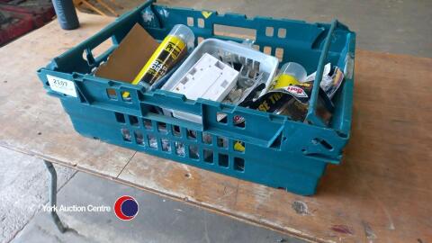 Crate of casters, tape, de-icer and tools