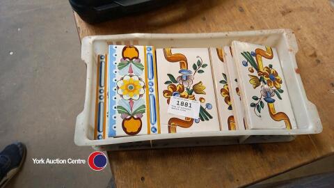 Tray of colourful Spanish tiles