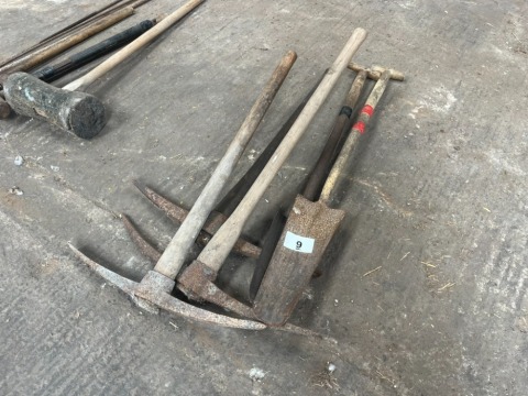 Various pick axes and narrow spades