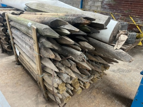 Quantity of round fence stakes